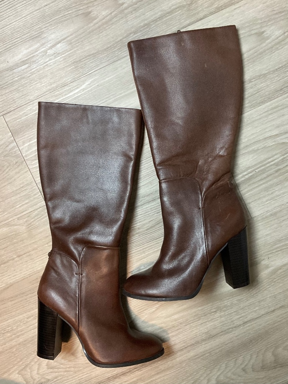 Liz & Co. brown leather knee-high block heel boots.